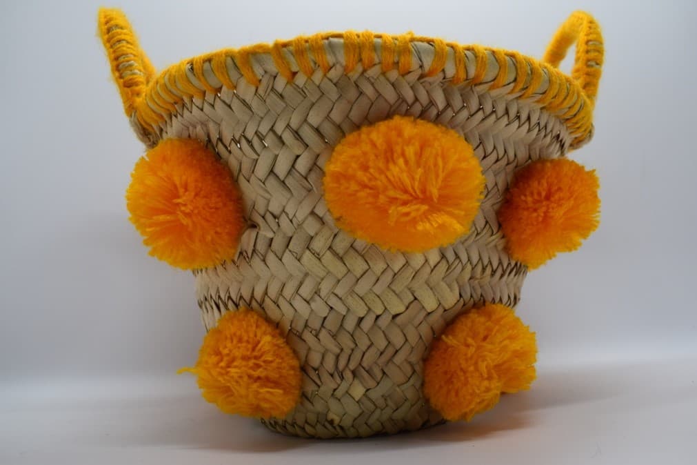 Les paniers avec des pompons