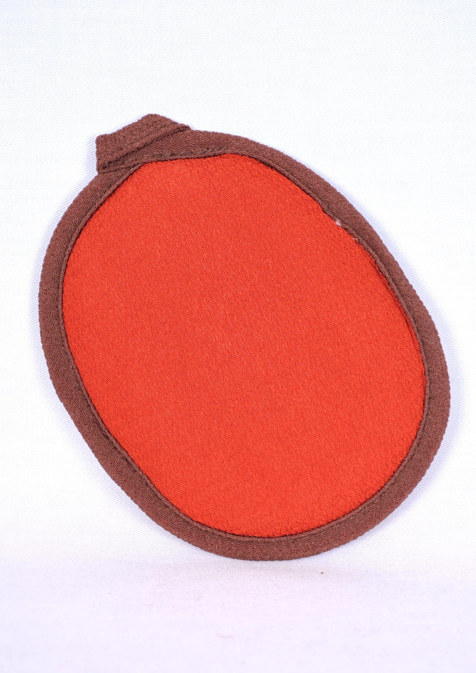 Gant de gommage pour le visage